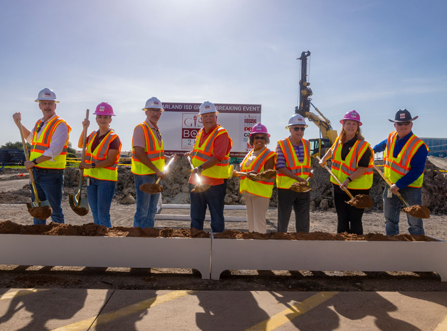 Board of Trustees and Dr. Lopez holding shovels during Garland Groundbreaking MAC and Schools
