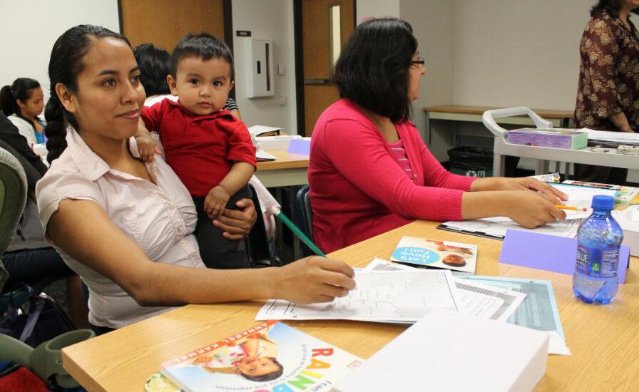 Parent taking notes