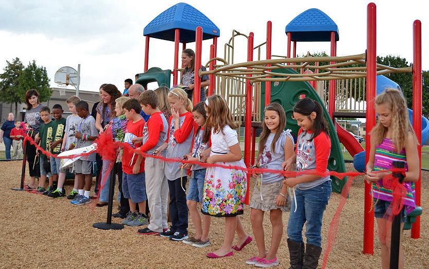 Herfurth playground ribbon cutting