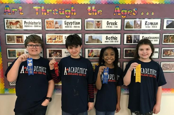 Elementary students with Art UIL ribbons