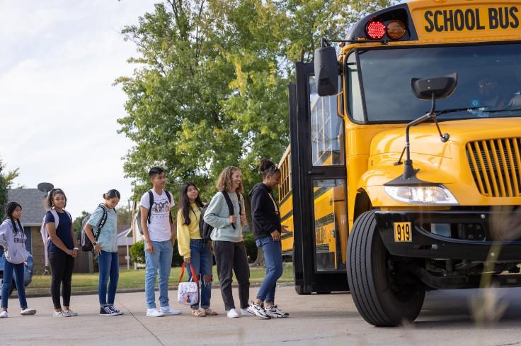 Students boarding school bus