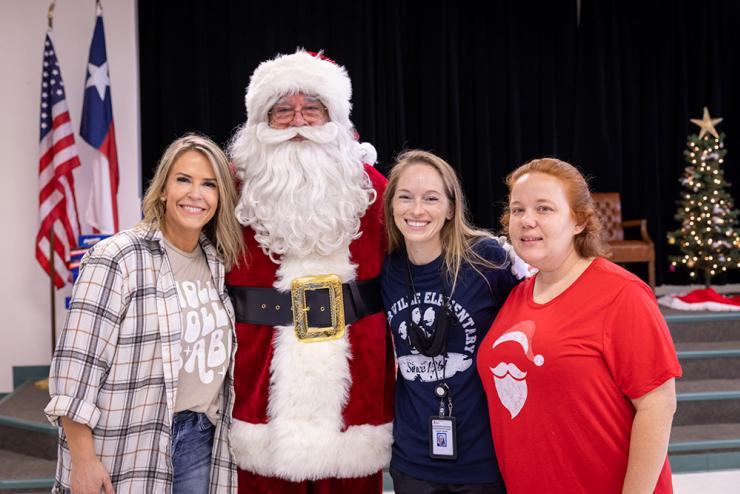 Donors pose with Santa