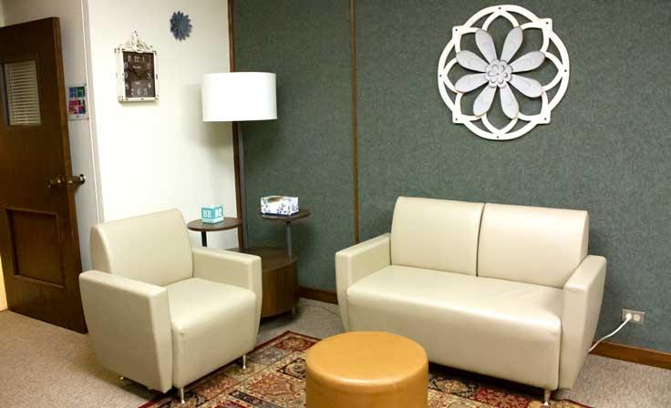 A wide-shot of the counseling room at the student services center