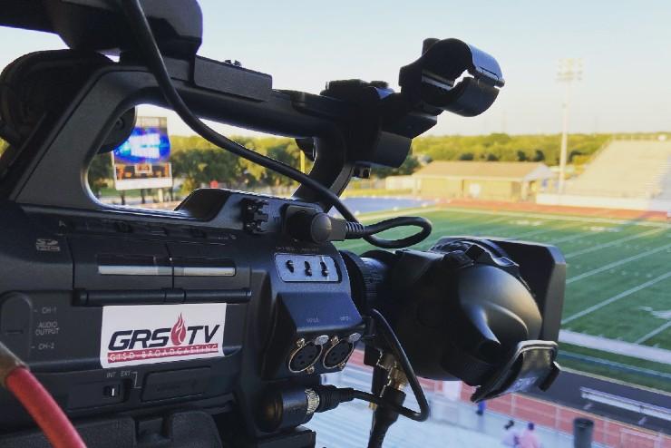 GRS-TV camera in the stands at a football game