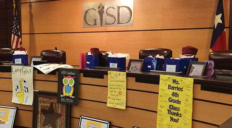 Many "thank you" signs made by students and different classes decorate the GISD Board Room.