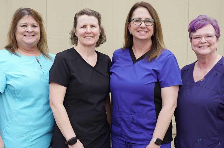 Group of smiling school nurses