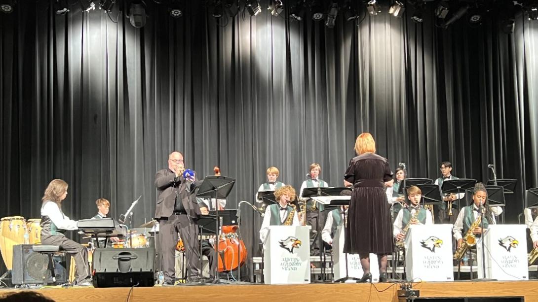 Austin Academy band performing on stage