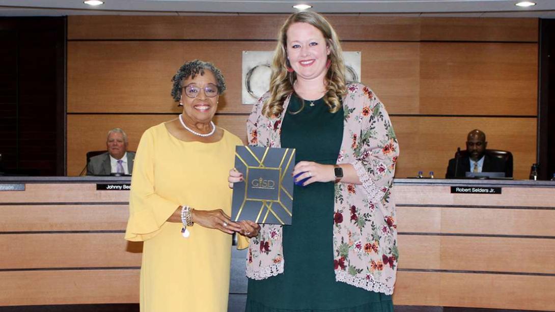 Chelsey Cody,Coordinator of Technology Digital Learning, Received a GEM award at the July 2023 GISD school board meeting with President Linda Griffin