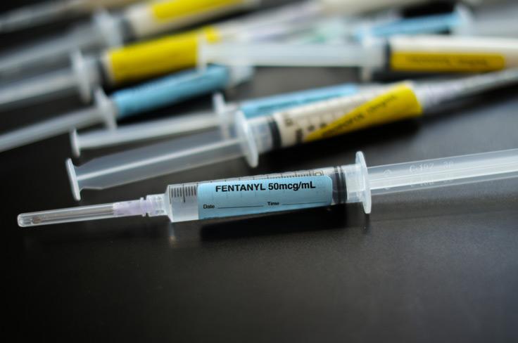 A zoomed-in photo of syringes filled and labeled "Fentanyl".