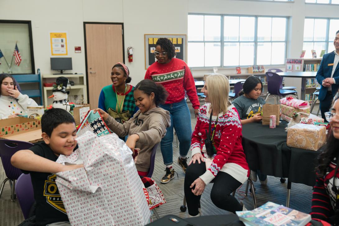 Students open gifts