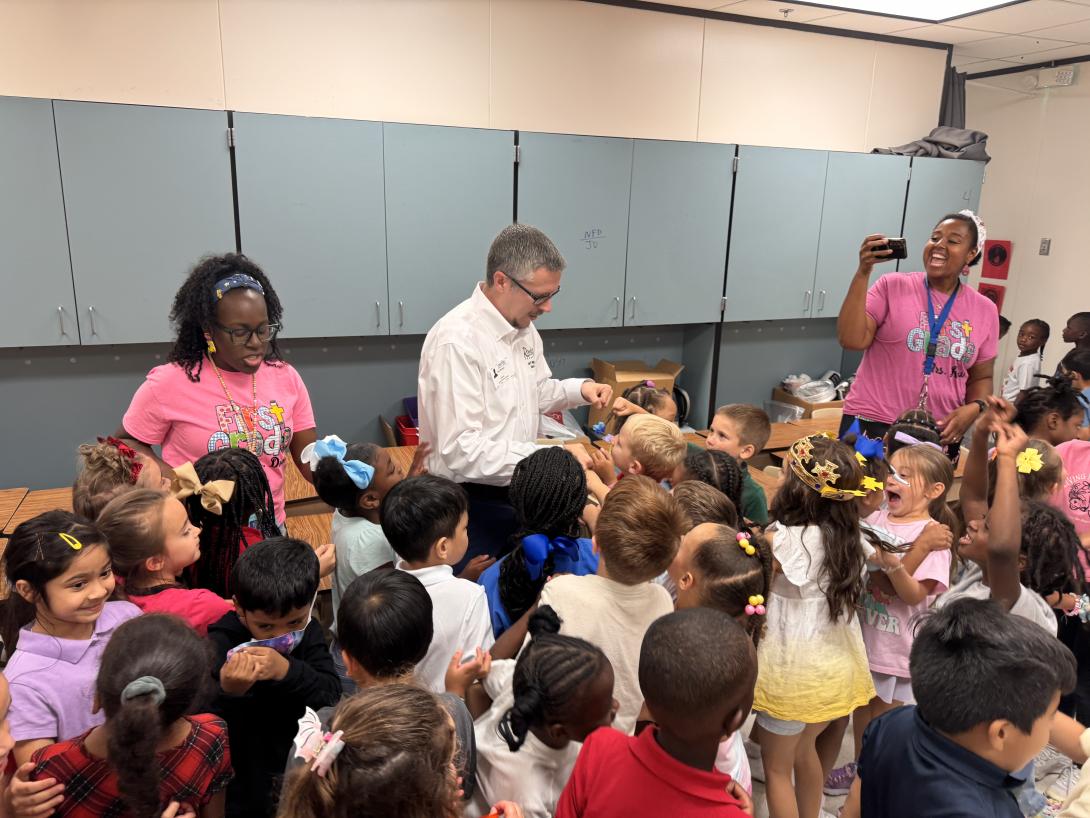 Rowlett Mayor interacts with several young students