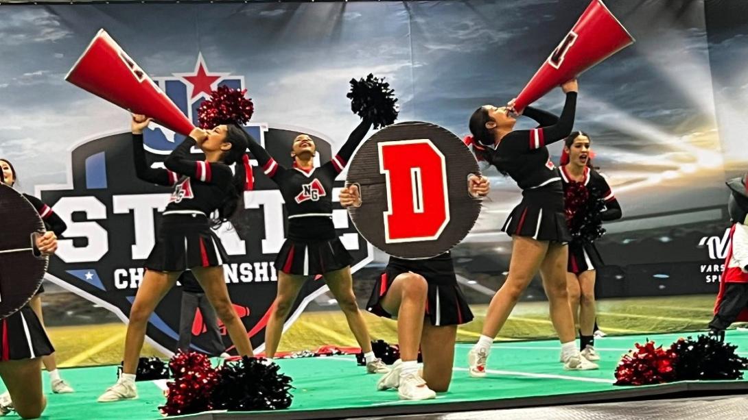 NGHS cheerleaders doing routine