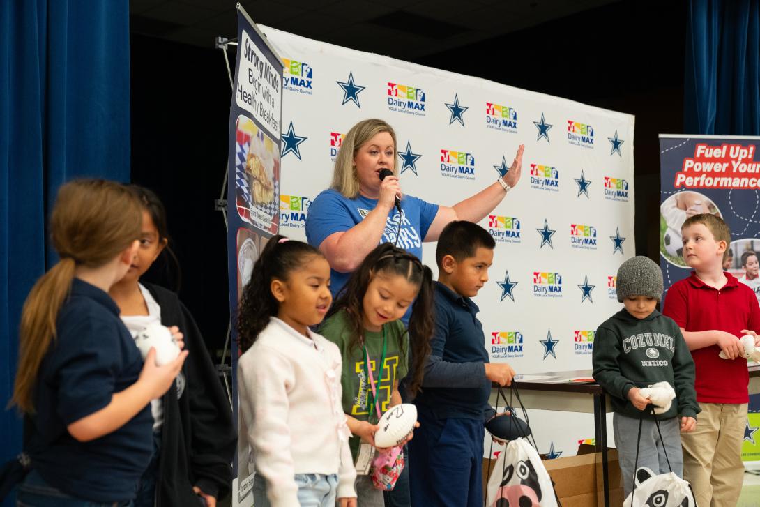 Students receive prizes on stage