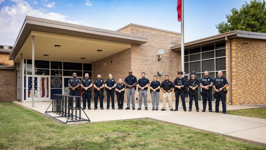Officers standing in front of training center