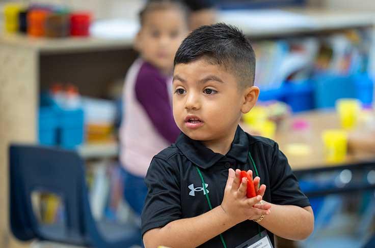 PreK boy looking inquisitive