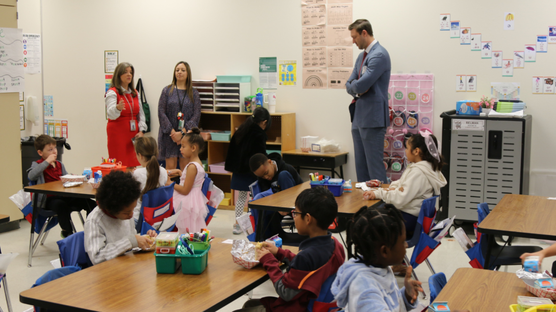 students enjoy breakfast in the classroom