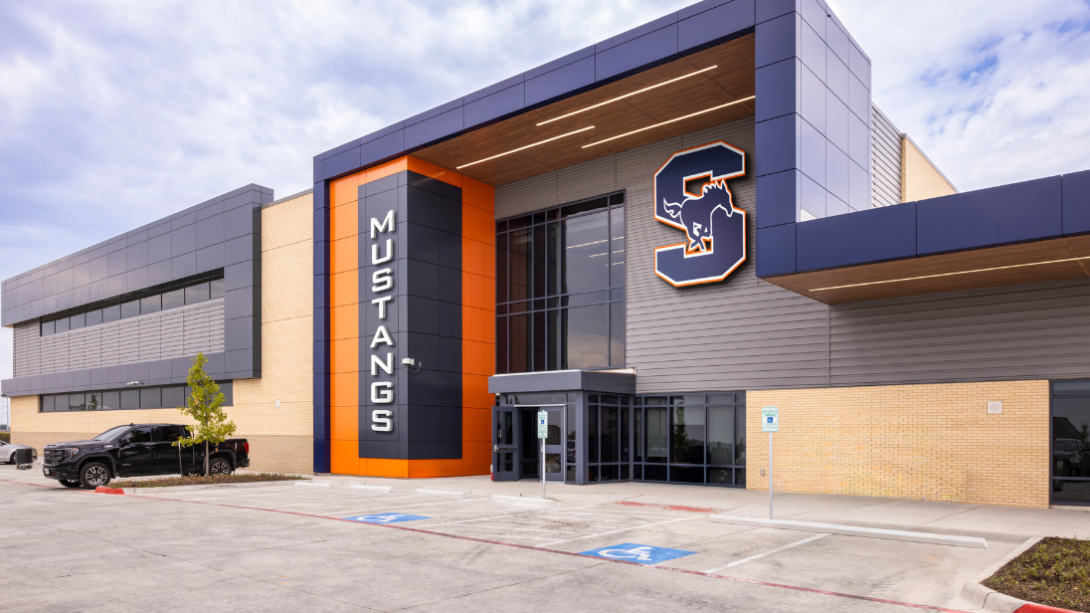 Exterior of a building with Sachse High School branding